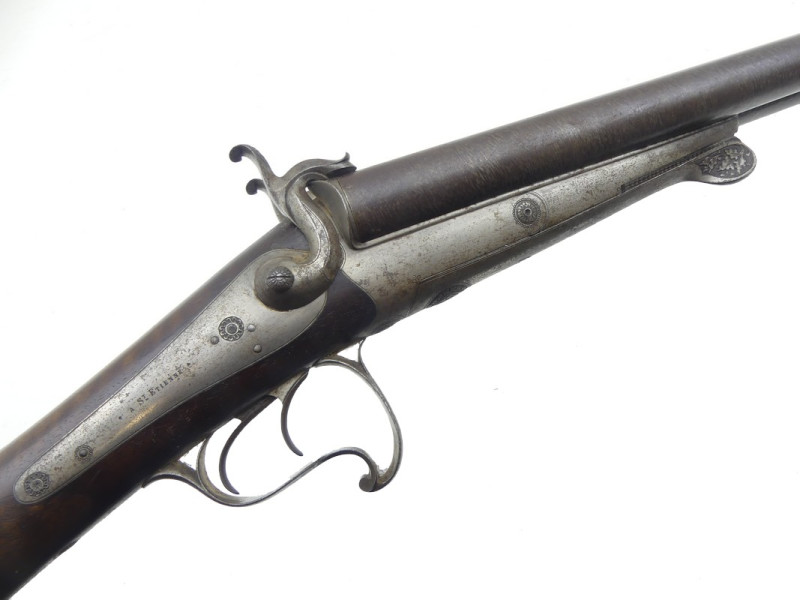FUSIL DE CHASSE JUXTAPOSE A BROCHE CHALET.