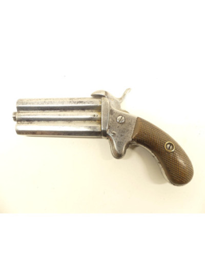 PISTOLET A BROCHE A DEUX CANONS SUPERPOSES.